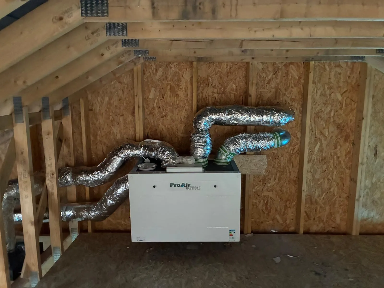 ProAir MVHR unit and ventilation ducts installed in an attic